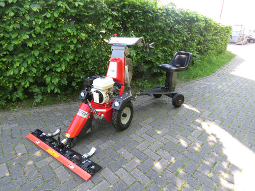 K-1500-with-Sulky-seat-and-reciprocating-mower-46.md